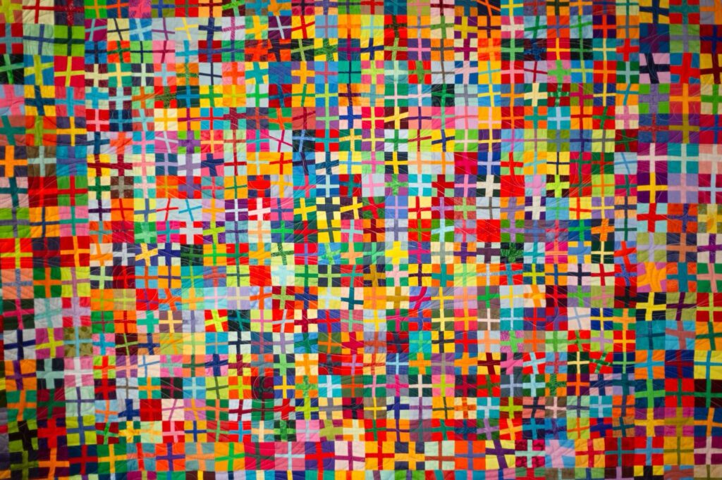 Das aktuelle Bild hat keinen Alternativtext. Der Dateiname ist: Gemeinschaftsquilt-.jpg